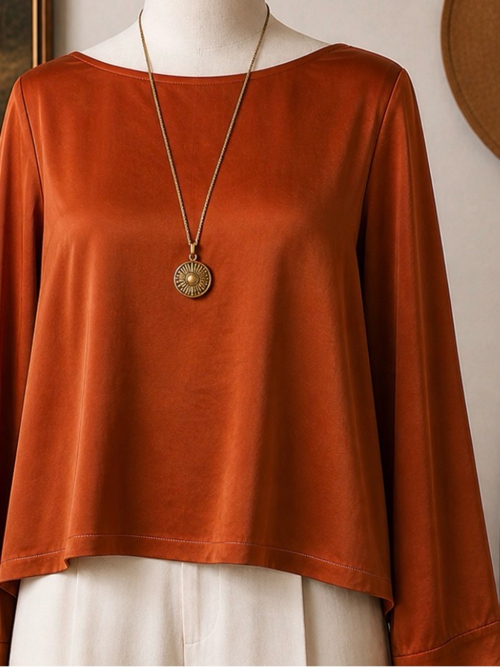 Prologue- satin top- boatneck- copper color- flared wide sleeves